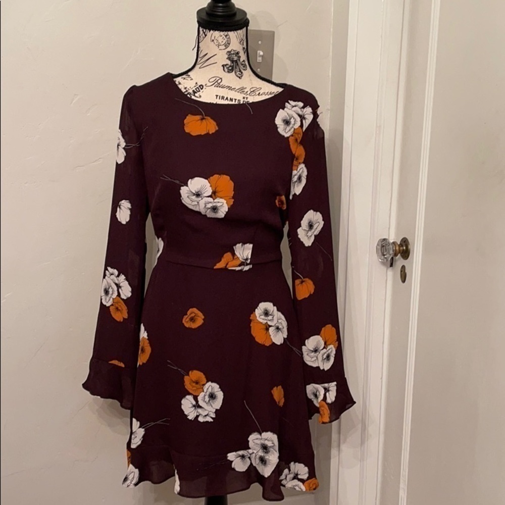 Cupcakes and Cashmere Lena floral dress.​​​​​​​​​​​​​​